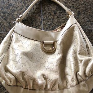Gray embossed Gucci shoulder bag